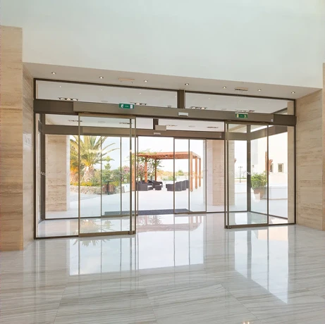 Automatic sliding glass entrance doors in a commercial lobby