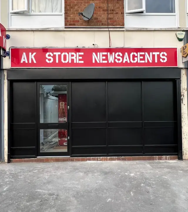 Black aluminium shopfront fitted for AK Store Newsagents