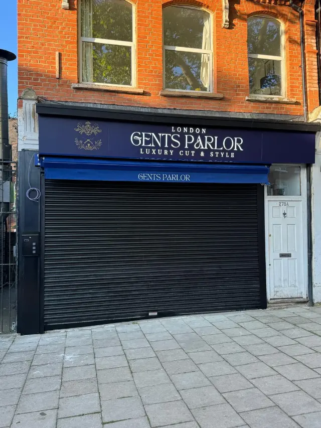 Black roller shutter for Gents Parlor barbershop