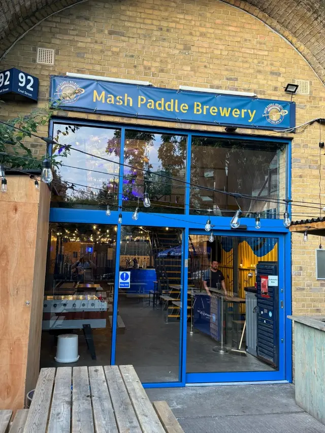Blue aluminium glazed frontage for the Mash Paddle Brewery taproom