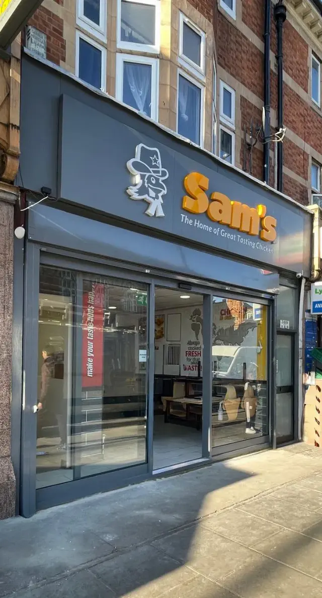 Grey aluminium and glass takeaway front for Sam's Chicken