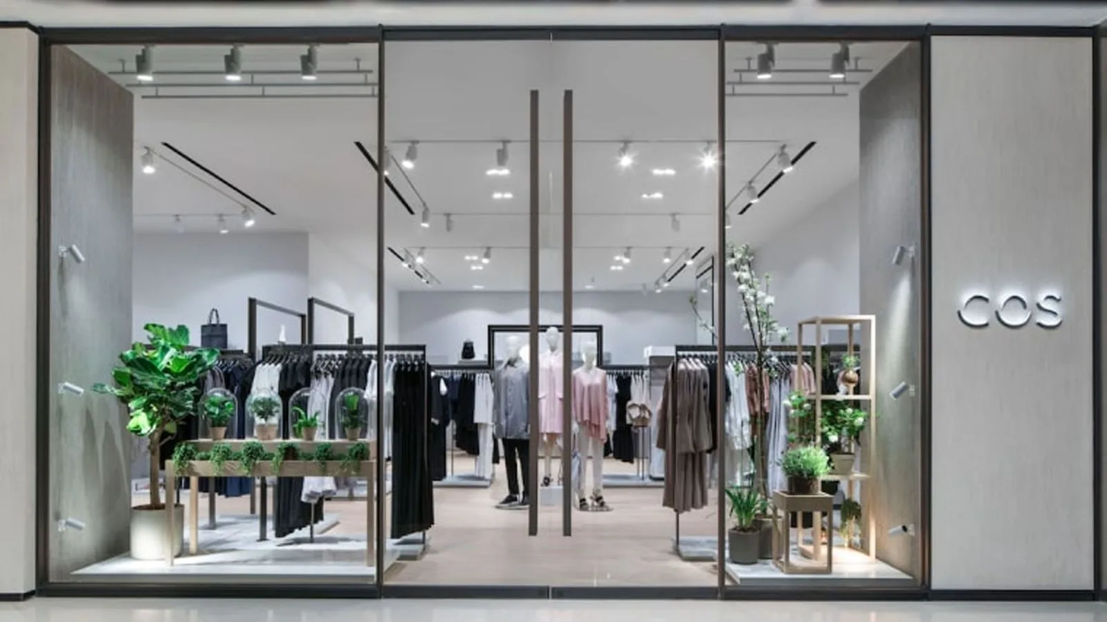 Frameless glass shop front of a minimalist retail store